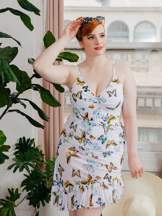 EINTEILIGER BADEANZUG MIT BUTTERFLYS-RIEMEN & ÜBERDECKEROCK