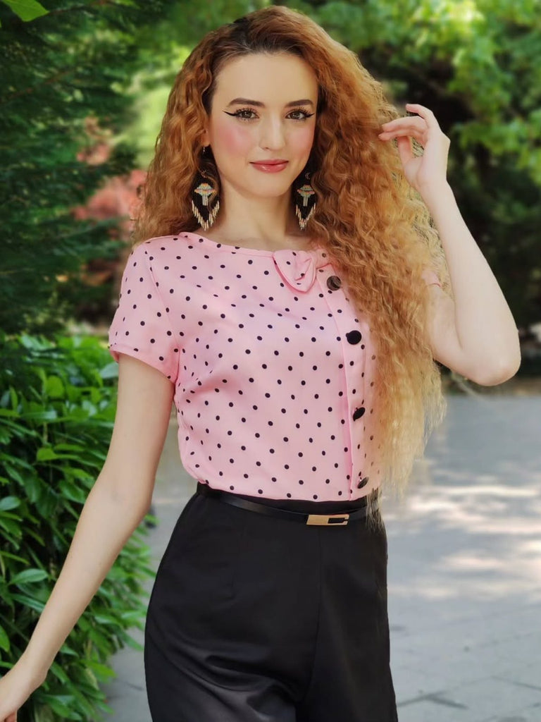 Rosa 1950er Polka Dot Bogen Romper