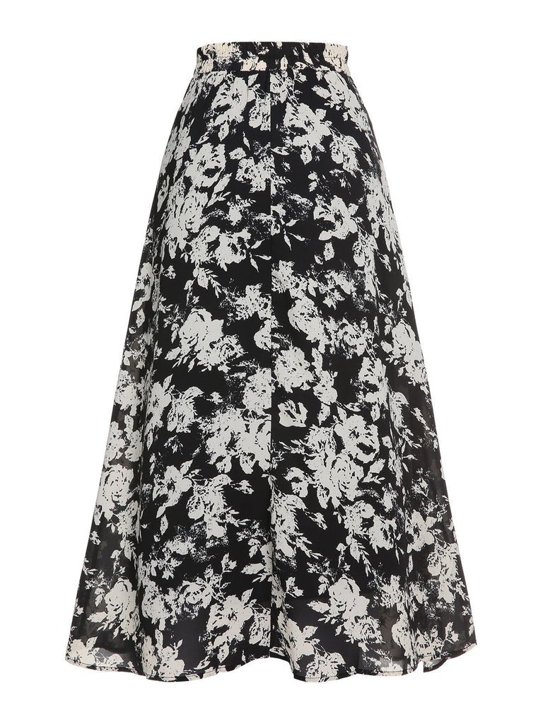 Schwarz-weißer 1960er Rock mit Blumendruck in A-Linie