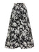 Schwarz-weißer 1960er Rock mit Blumendruck in A-Linie