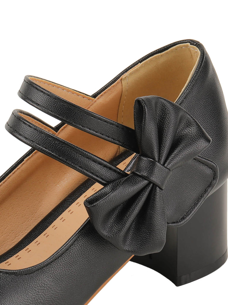 Schwarze Mary Schuhe mit klobigem Absatz und Schleife