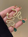Vintage Gold Schlangensmaragd-Ohrringe